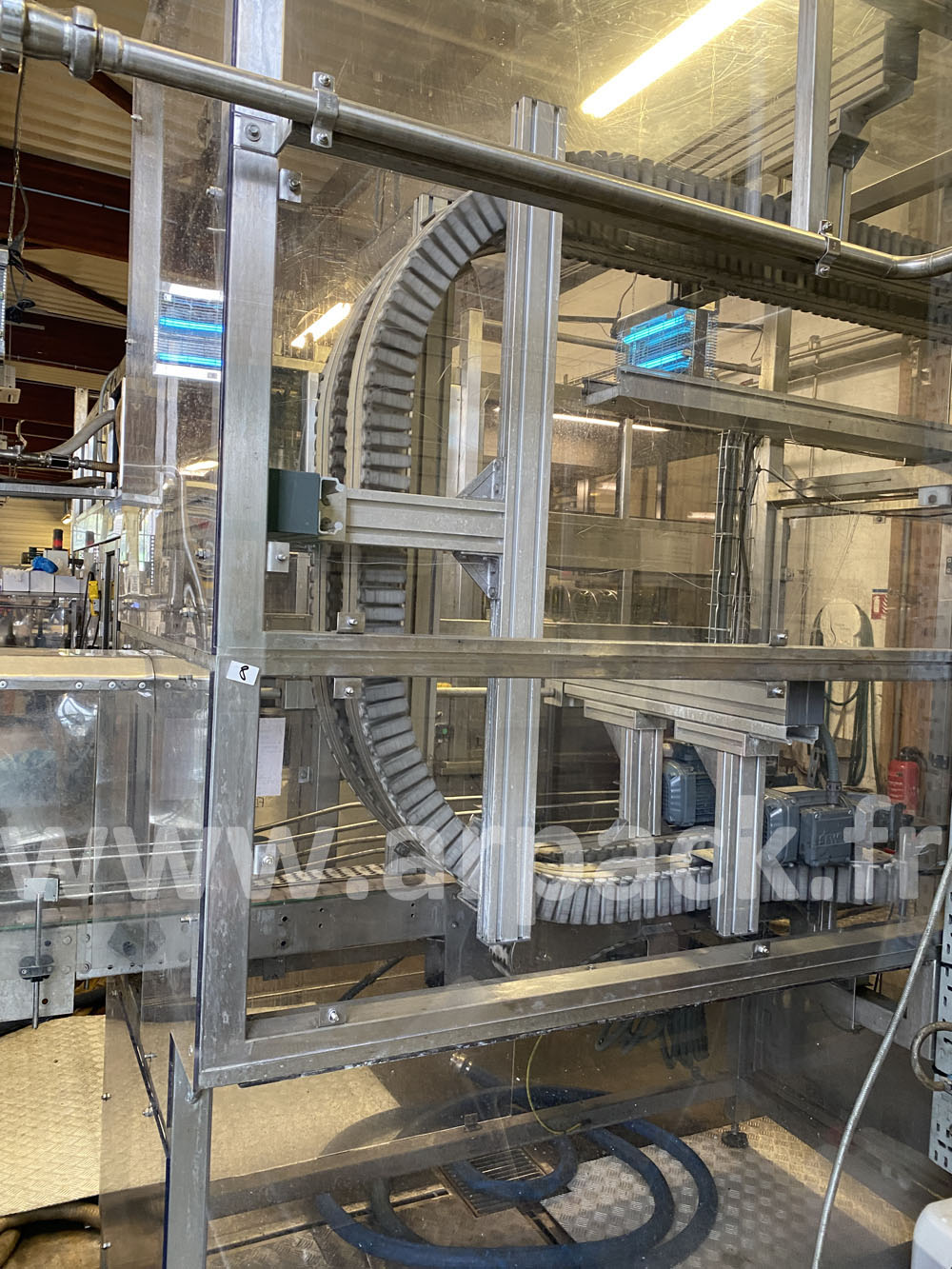 Retournement de bouteilles avec insufflage FLEXLINK